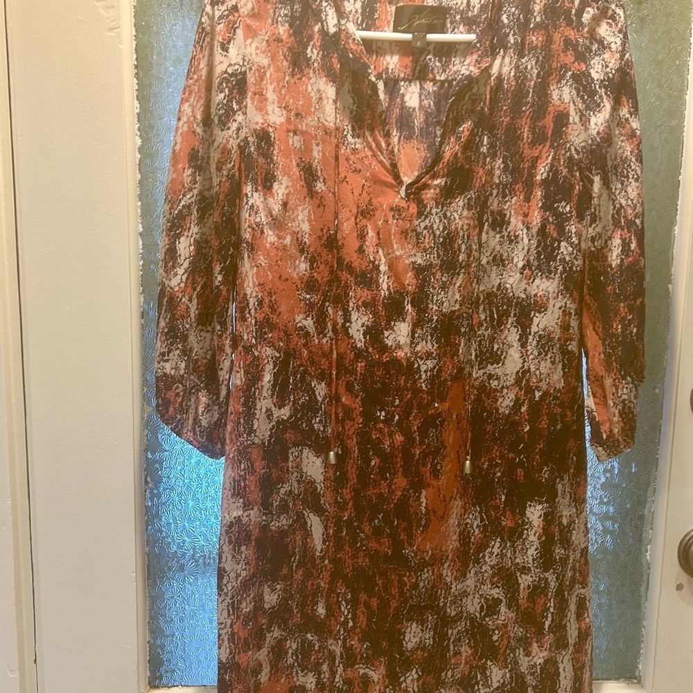 Akiko S 100% silk multi print dress. 3/4 length sleeves, v neck knee length.